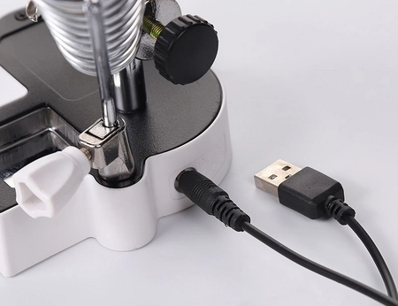 Main professionnelle troisième avec loupe et éclairage LED