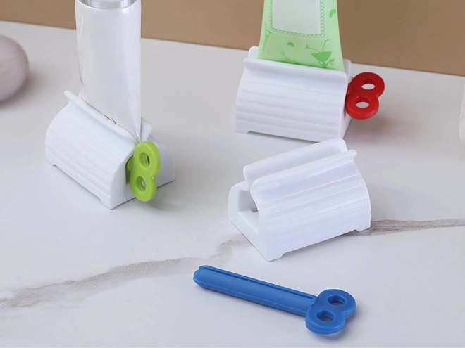 Presse-tube pour crèmes et dentifrice