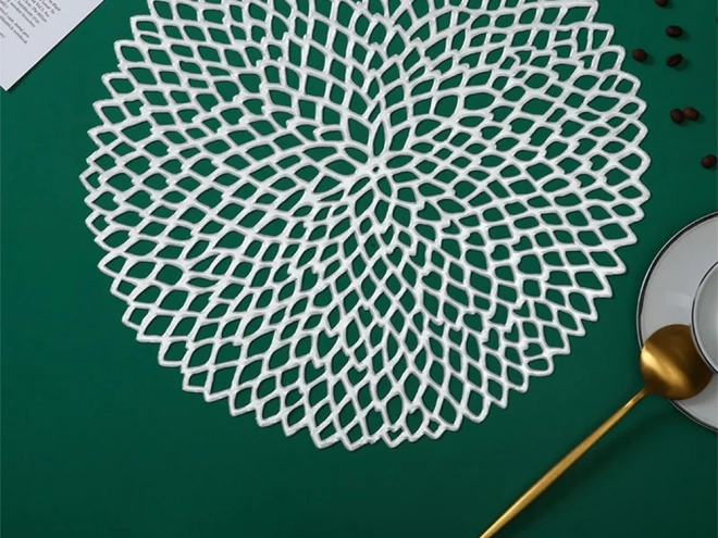 Nappe ronde en plastique ajourée