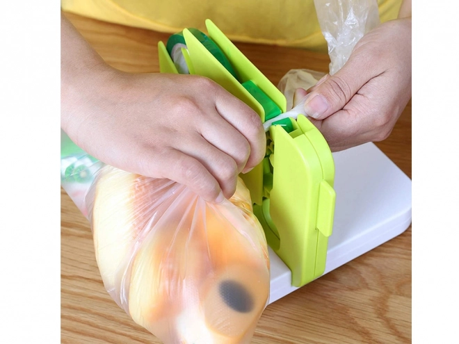Appareil de fermeture de sacs en plastique