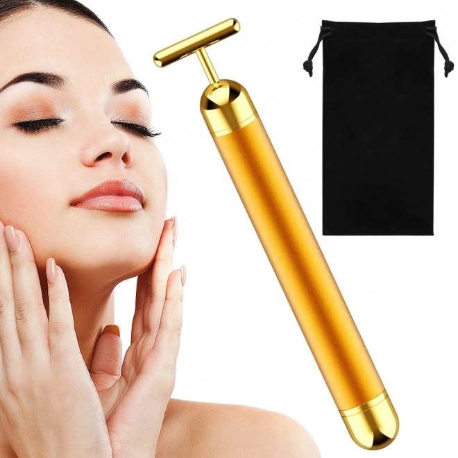 Appareil de massage facial en or vibrant
