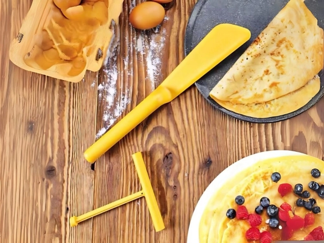 Spatule et rouleau à crêpes