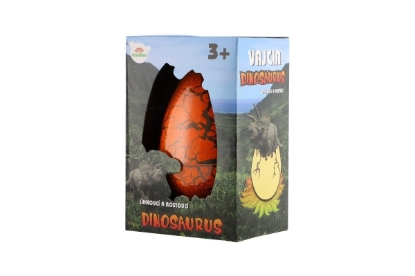 Œuf avec dinosaure éclosant