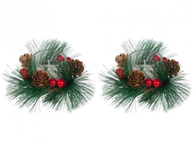 Bougies de Noël décoratives dans une couronne en verre