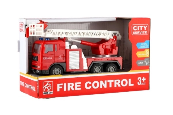 Voiture de pompiers en plastique 16cm à inertie avec batterie avec lumière et son dans une boîte 21x13x9cm