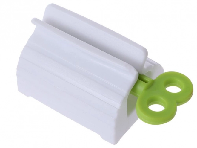Presse-tube pour crèmes et dentifrice