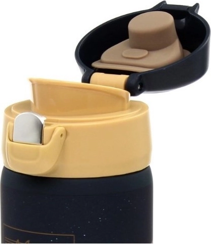 Couvercle à bouton avec verrou de sécurité