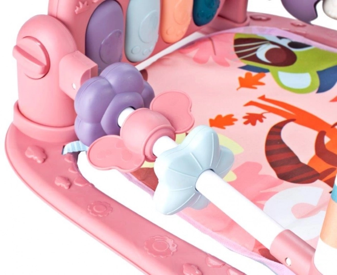 Tapis d'éveil éducatif rose avec piano et hochets