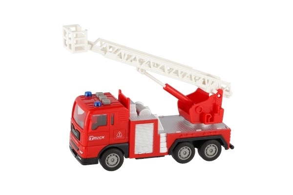 Voiture de pompiers en plastique 16cm à inertie avec batterie avec lumière et son dans une boîte 21x13x9cm