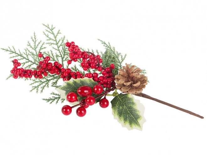 Élément décoratif de centre de table de Noël avec des sorbes et une pomme de pin