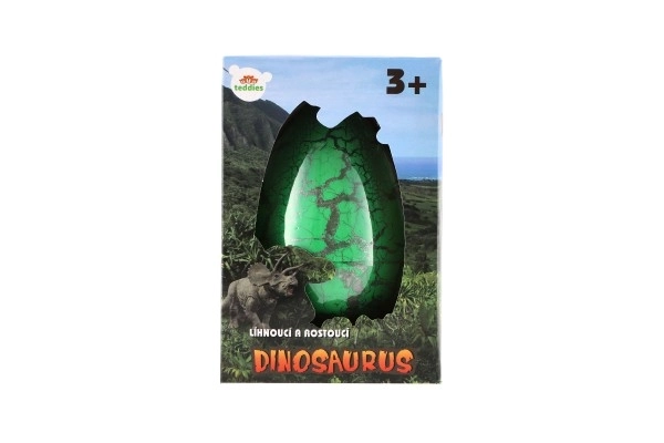 Œuf avec dinosaure éclosant