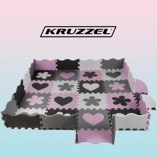Puzzle en mousse rose contrastée avec cœurs et fleurs