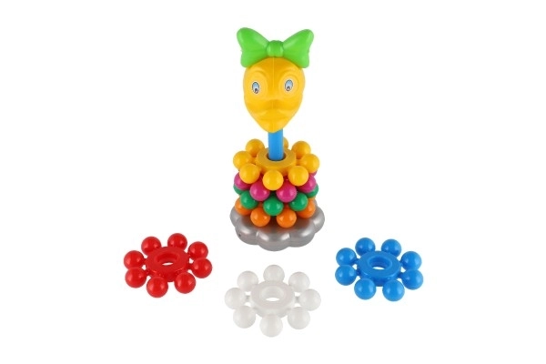 Puzzle pyramide avec anneaux en plastique 26cm dans un filet 12m+