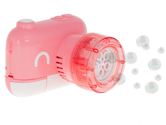 Appareil photo rose avec solution à bulles