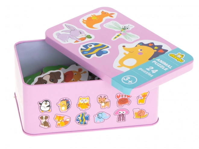 Puzzle avec motifs d'animaux dans une boîte en métal