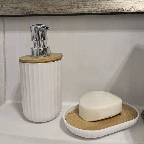 Distributeur élégant et fonctionnel avec porte-savon