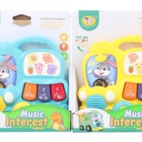 Petit piano en forme de bus avec sons d’animaux