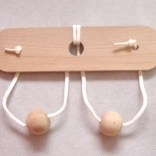 Casse-tête en bois Seins