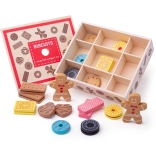 Boîte en bois avec jouets biscuits