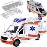 Ambulance de secours des pompiers avec lumières et sons, portes ouvrantes et brancard